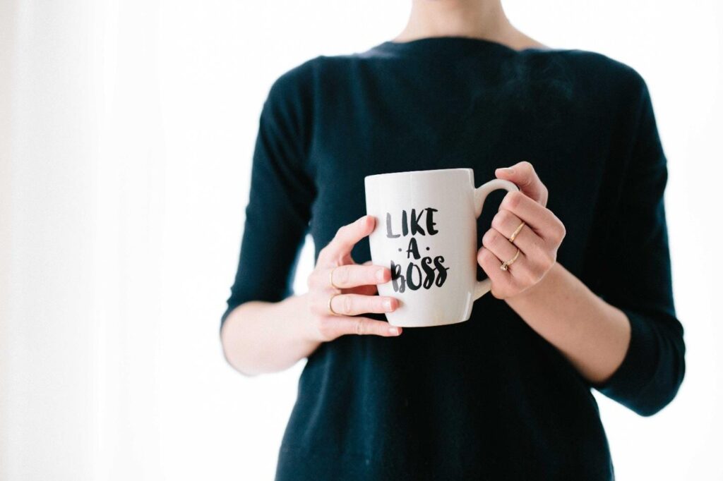 Woman with mug that says "Like a Boss"